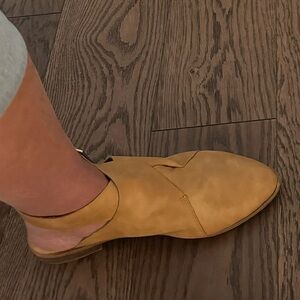 Beautiful tan leather shoes.